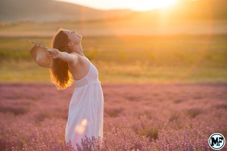Mercy to Faith blog Images - A Lady Praising God Outside